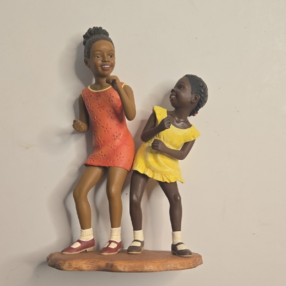 Dancing Sisters Figurine - Orange and Yellow.By Brenda Joysmith